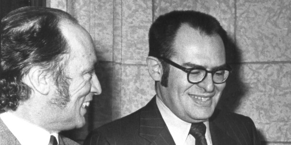 Pierre Trudeau shares a laugh with Herb Gray