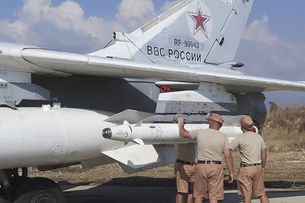 Russian technicians in Syria prepare a jet for a bombing mission