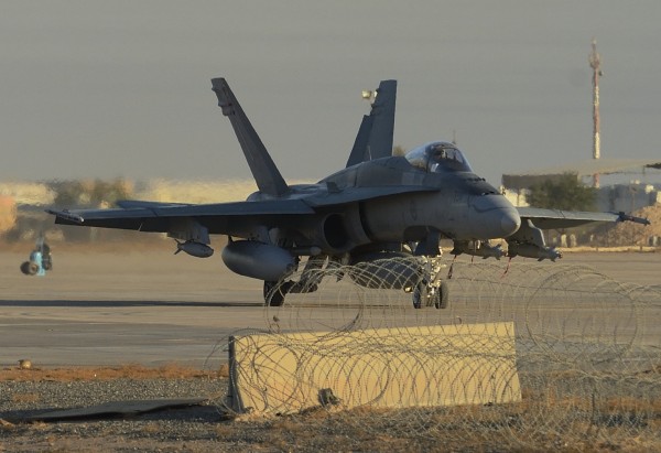 A Canadian CF-18 fighter jet in Kuwait taxis to take off for a mission over Iraq 