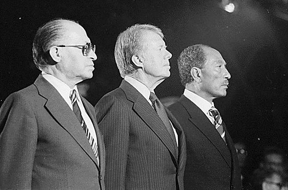 Jimmy Carter, center, invited Anwar Sadat, right, and Menahem Begin, left, to the Camp David summit