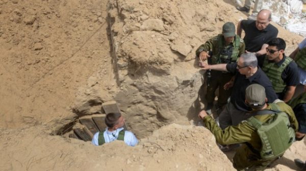 Benjamin Netanyahu inspects a Hamas tunnel discovered in April