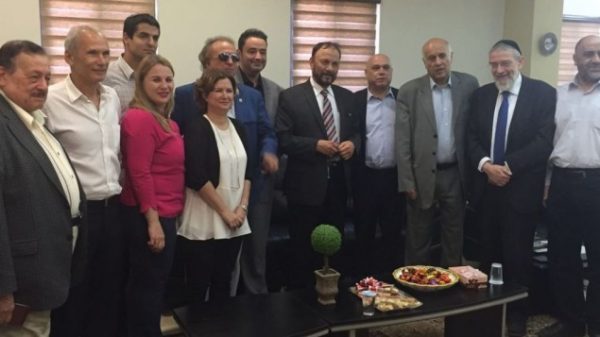 Anwar Eshki, center, and his Saudi delegation meet Israeli members of parliament in Jerusalem