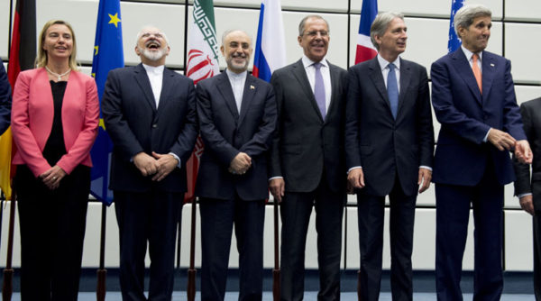 Major power leaders pose for photographs after nuclear agreement is sealed