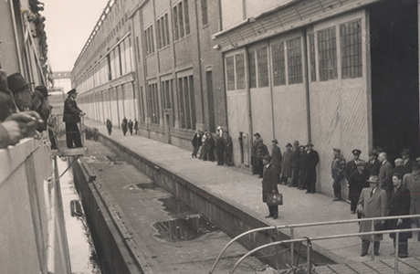 A ship docks at Pier 21 after World War II