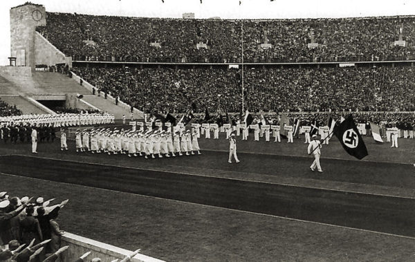 The German team marches into the Olympic stadium in Berlin, 1936