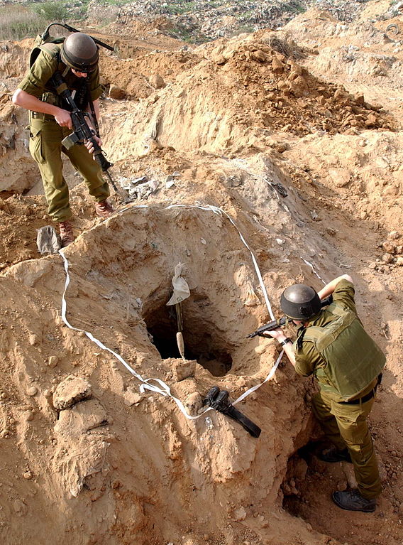 Israeli soldiers inspect a Hamas attack tunnel