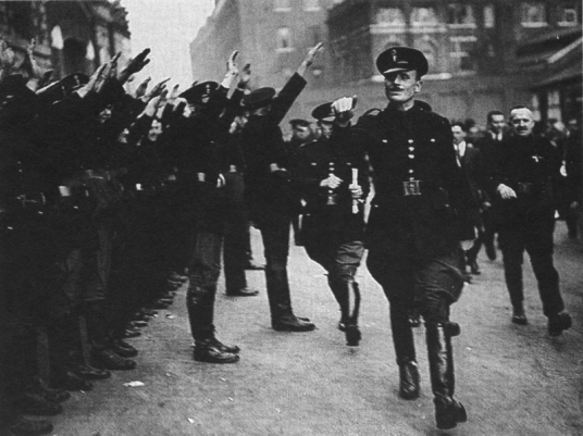 Sir Oswald Mosley inspects a contingent of Black Shirts