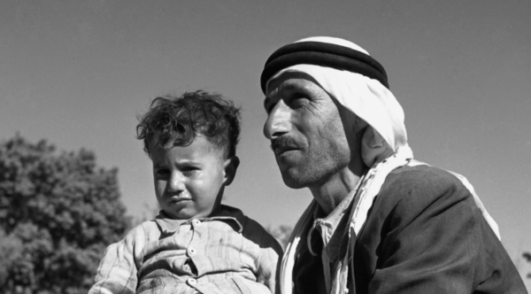 A Palestinian man and his son